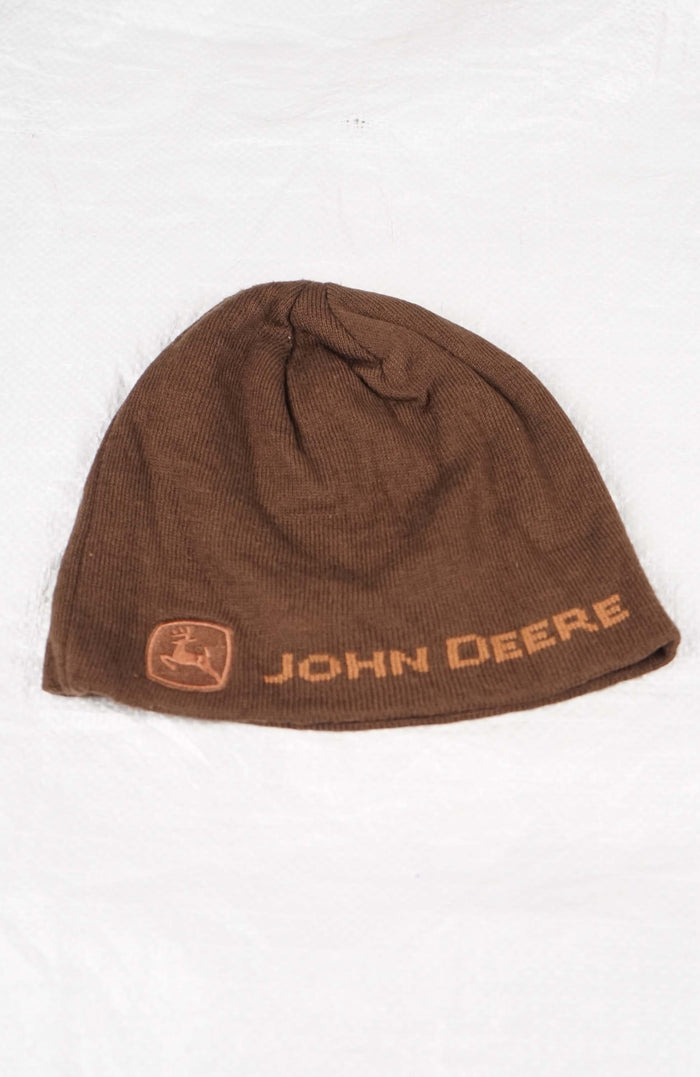 Brown beanie with John Deere logo on a white background