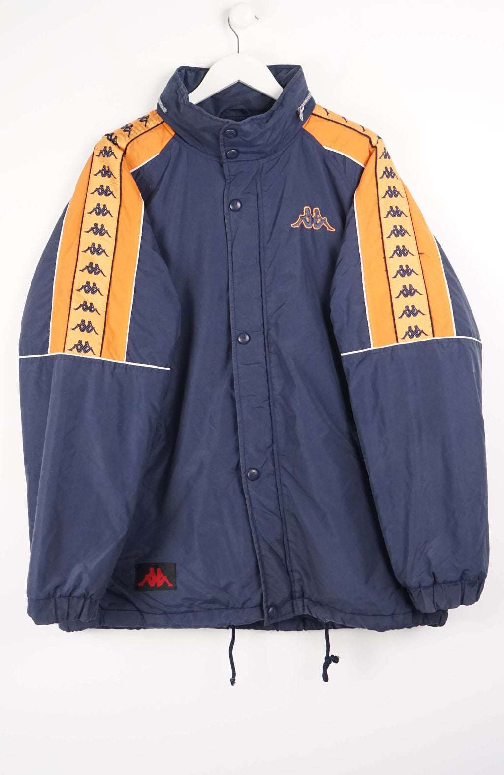 Navy jacket with orange accents on a white background