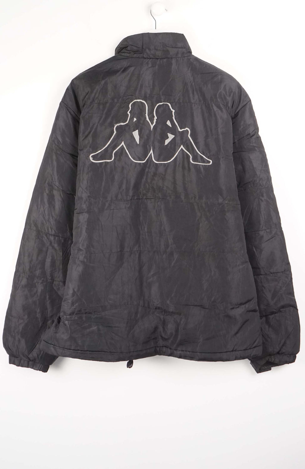 Black jacket on a hanger against a white background