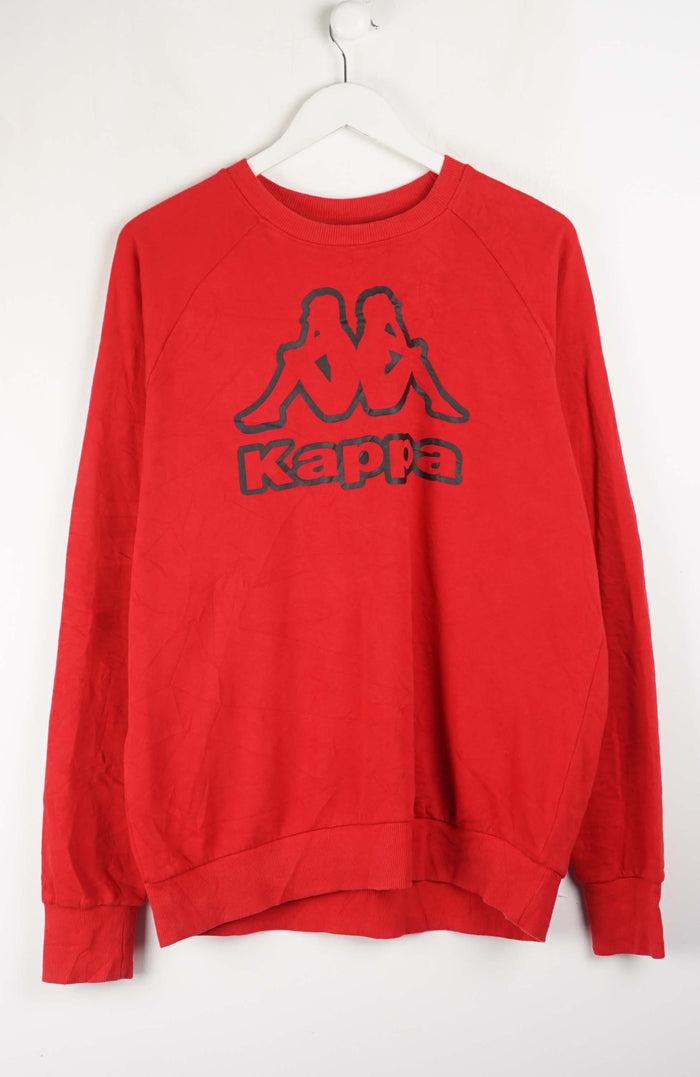 Red Kappa sweatshirt on a white hanger against a white background