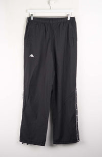Black pants with a brand logo on a white background