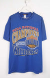 Blue t-shirt with 'NCAA National Champions Kentucky Wildcats' text on a white background