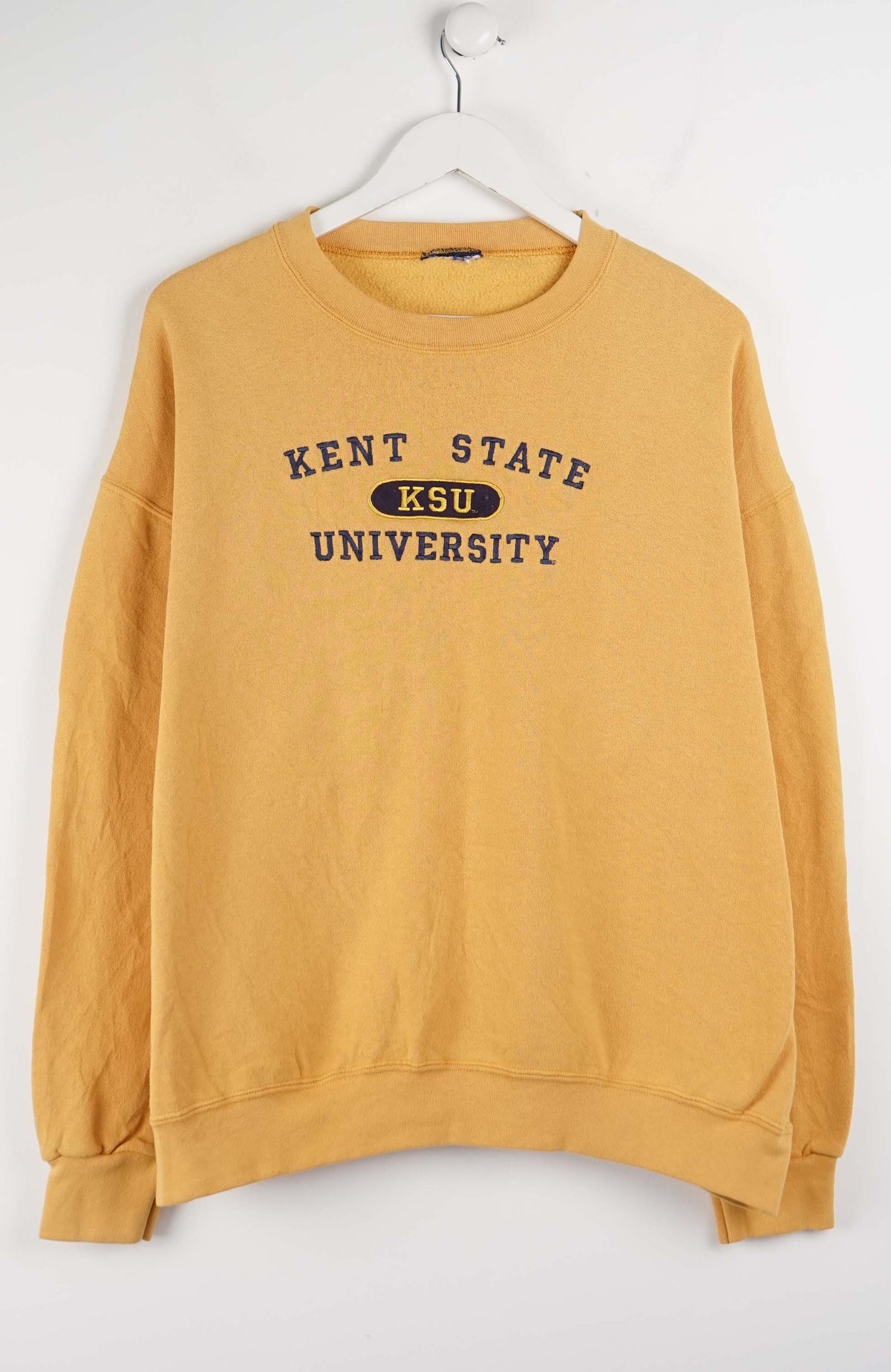 Mustard yellow sweatshirt with 'Kent State University' text on a white background