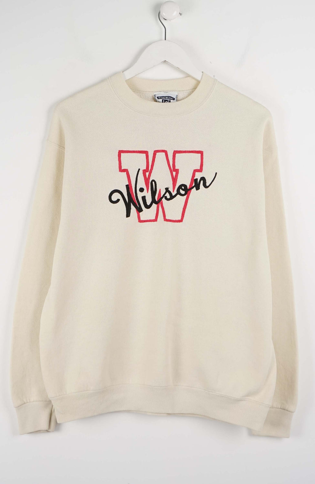 Beige sweatshirt with 'Wilson' logo on a white background