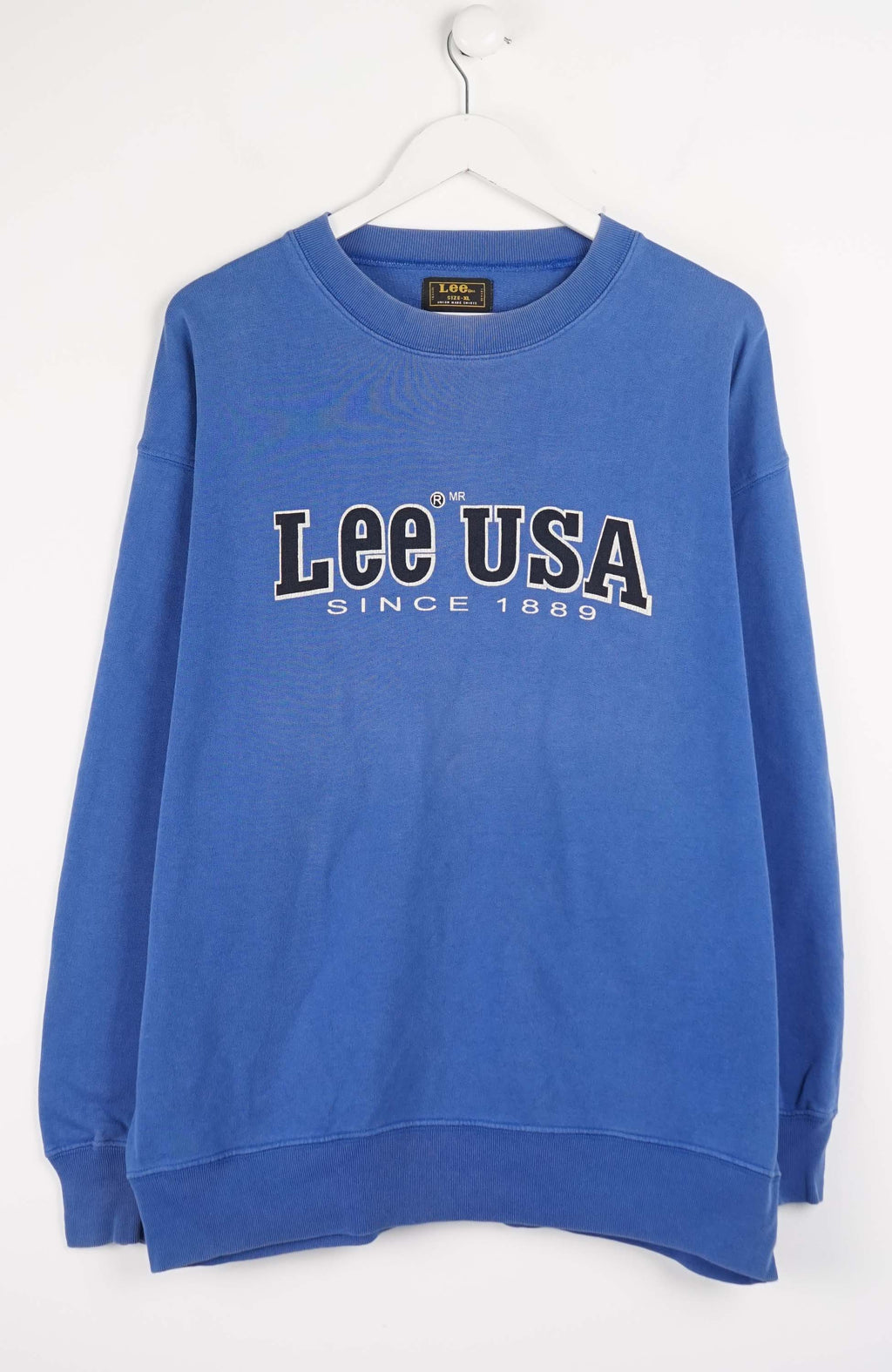 Blue sweatshirt with 'Lee USA Since 1886' text on a white background