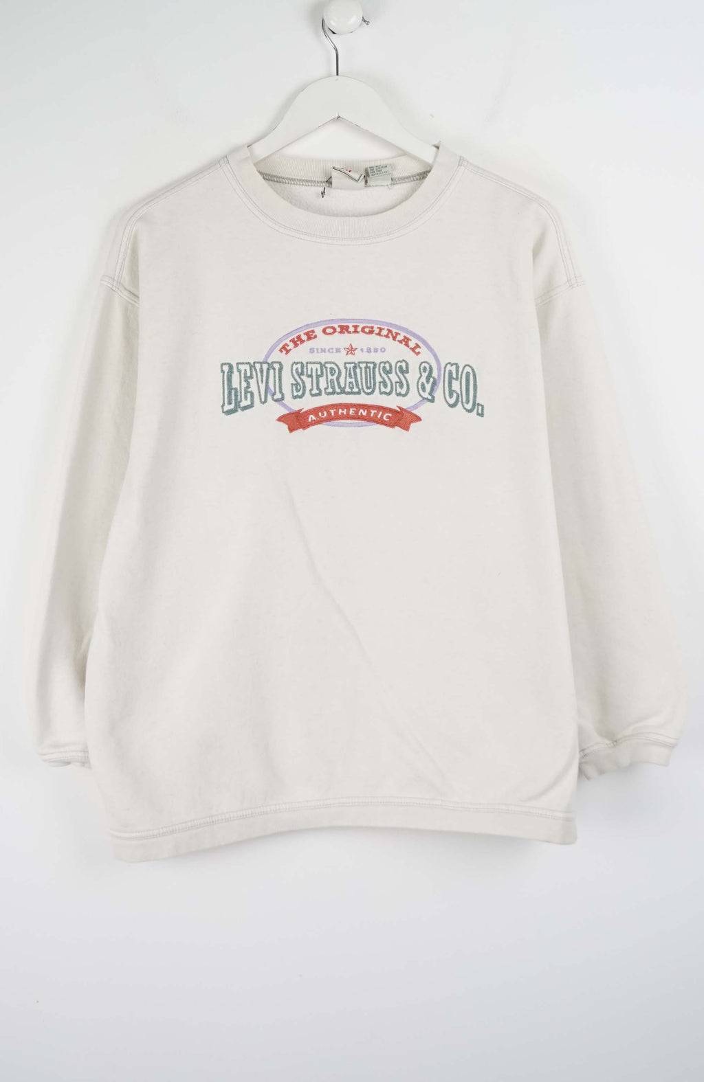 Beige sweatshirt with Levi Strauss & Co. logo on a white background