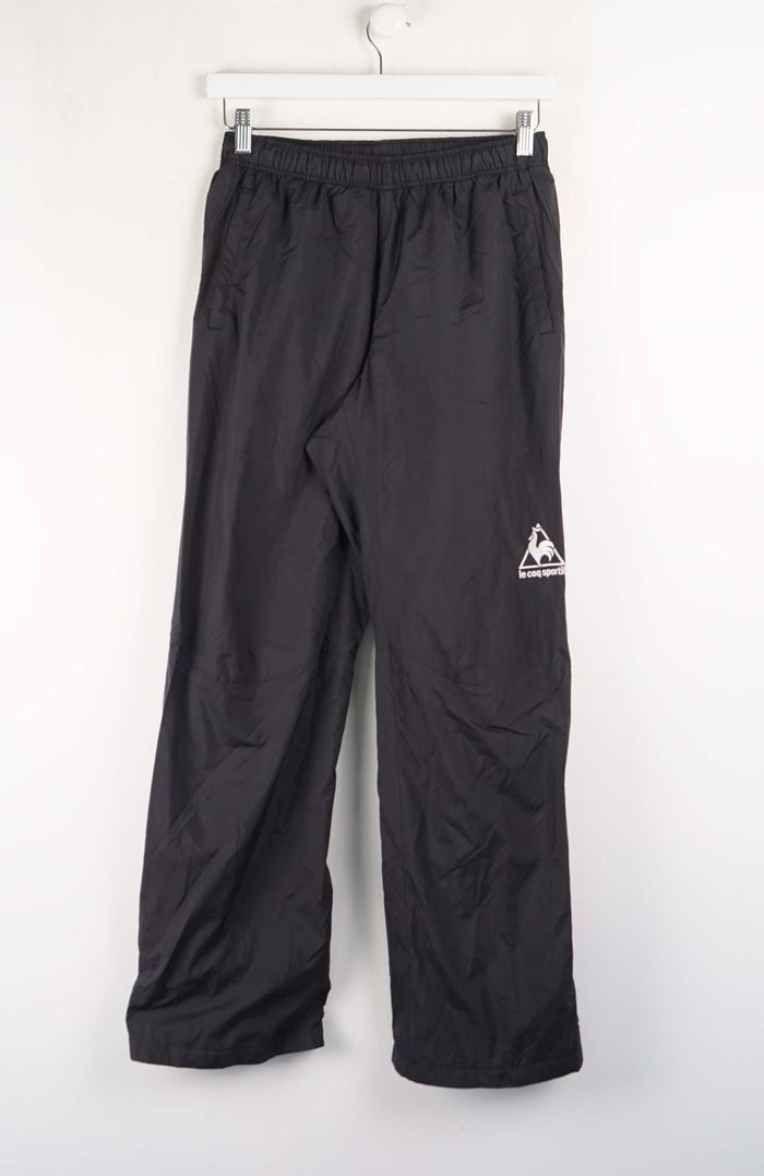 Black pants with a logo on a white background