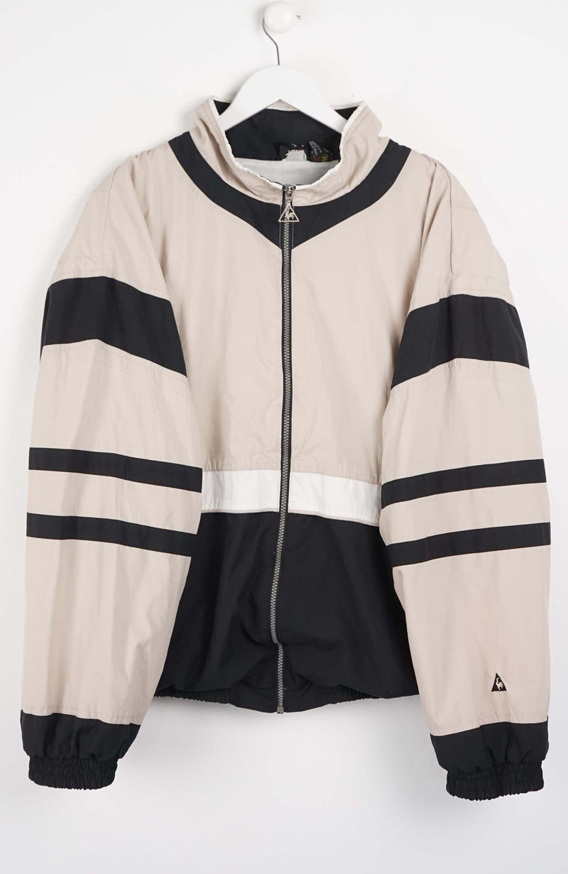 Beige and black jacket with striped pattern on a white background