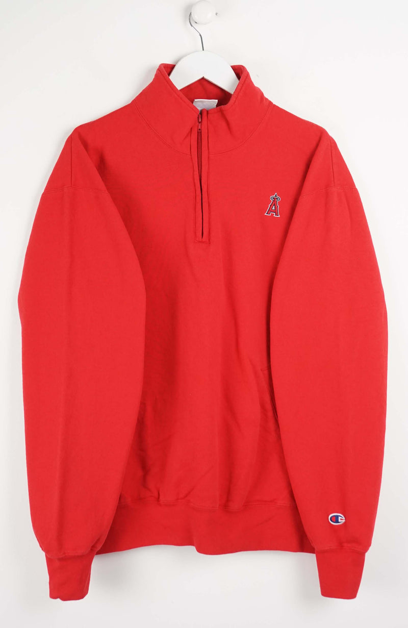 Red sweatshirt with a small logo on a white background