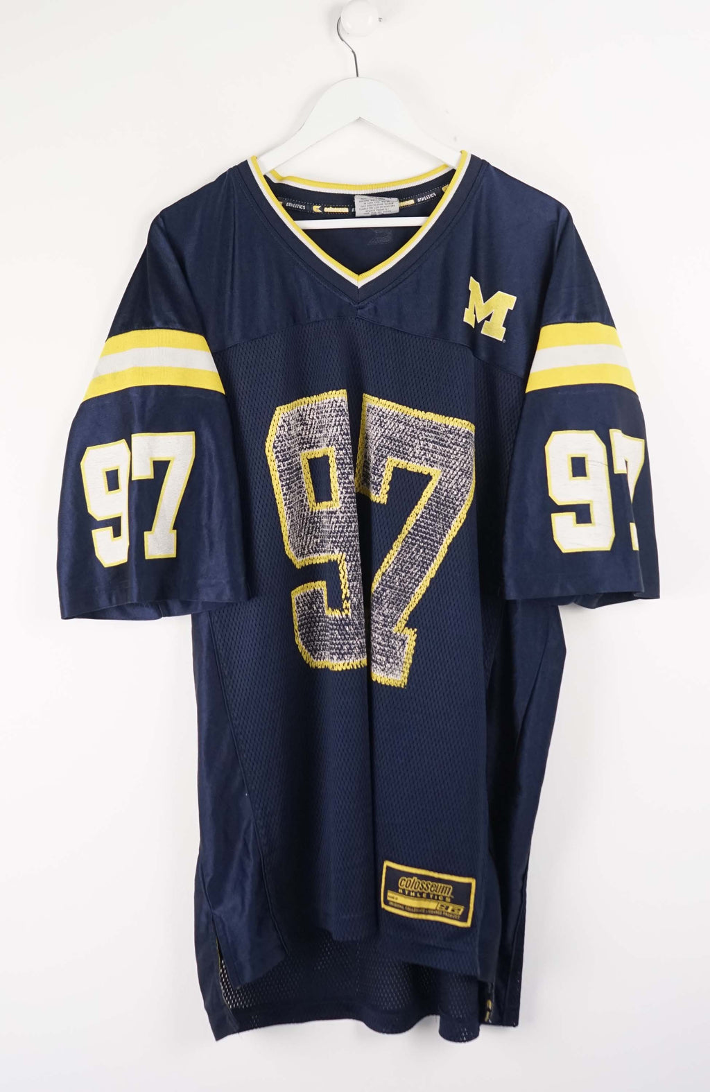 Navy blue sports jersey with yellow accents and number 97 on a white background