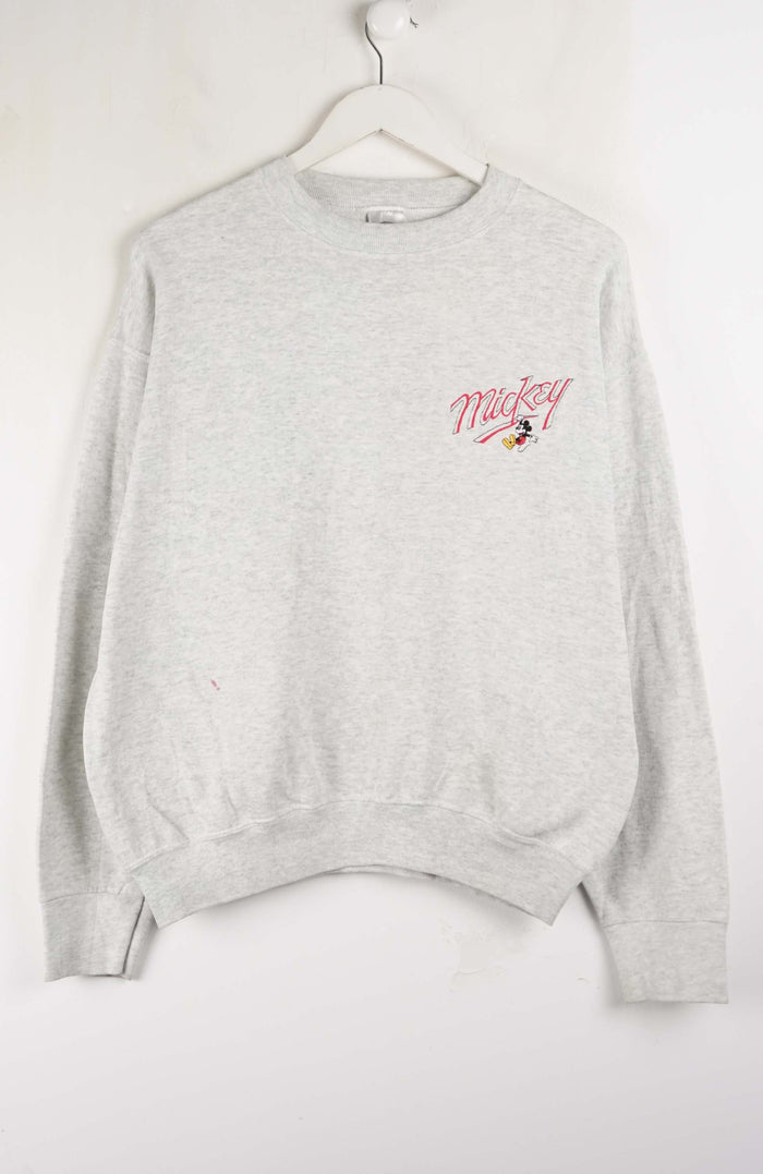 Gray sweatshirt with a logo on a white background