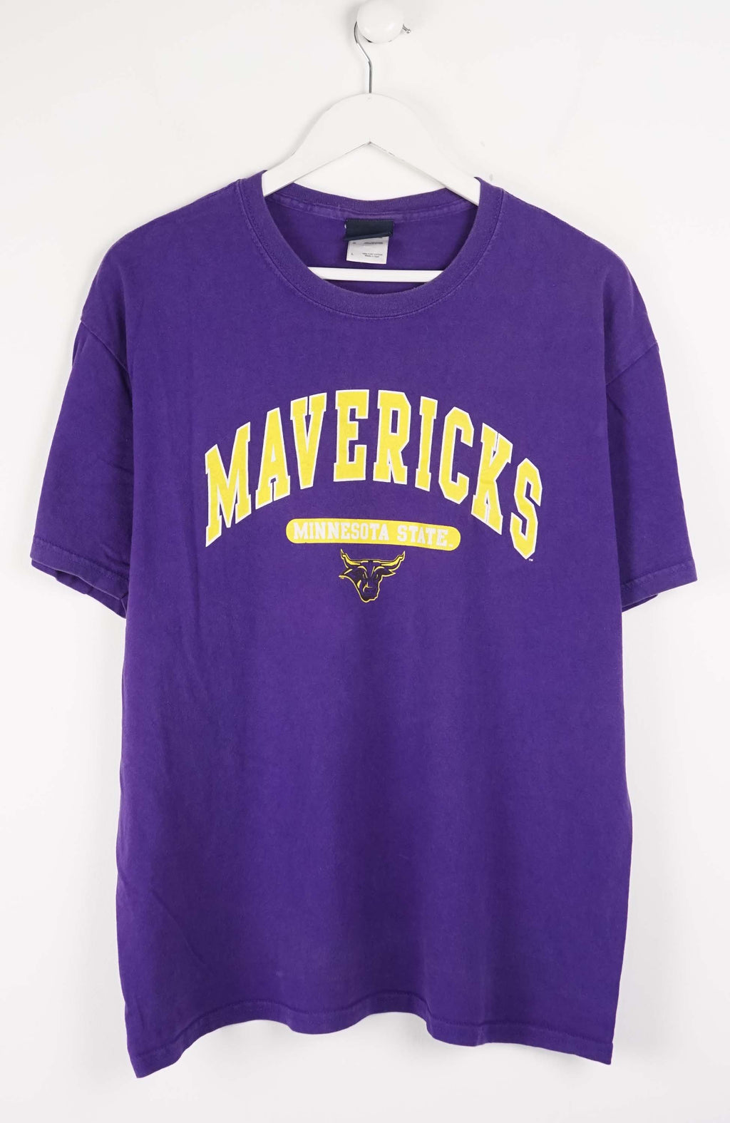 Purple t-shirt with 'Mavericks' text and logo on a white background