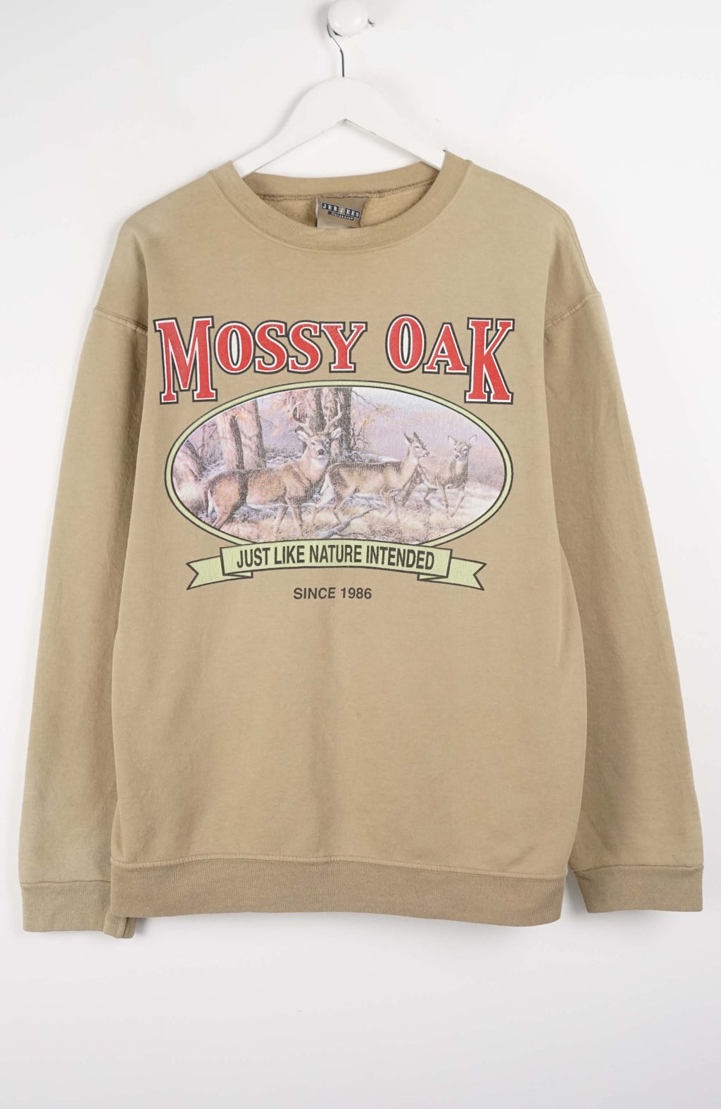 Beige sweatshirt with 'Mossy Oak' logo on a white background