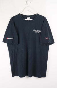 Navy blue t-shirt with logos on a white background