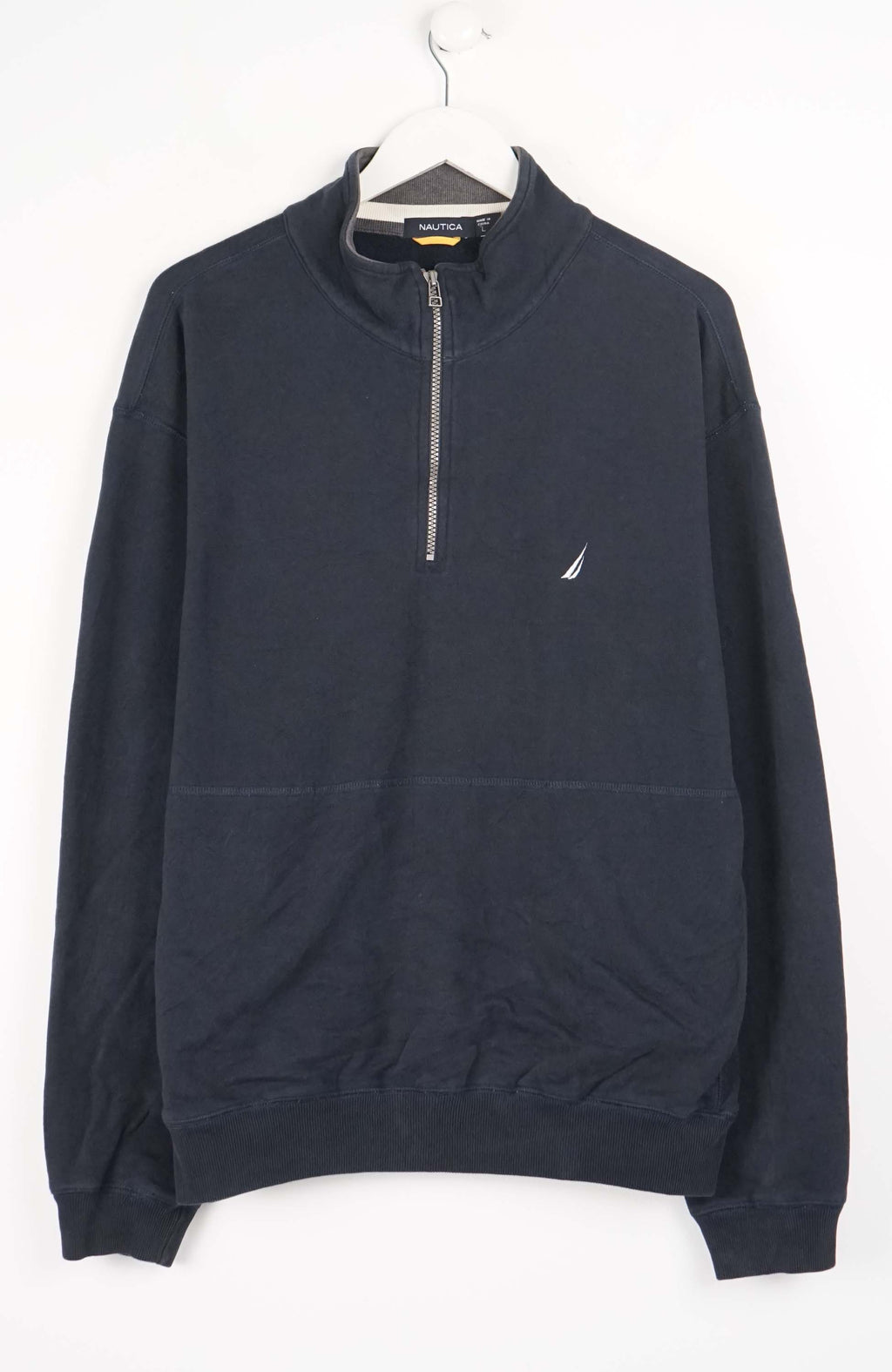 Navy blue half-zip sweatshirt on a hanger against a white background