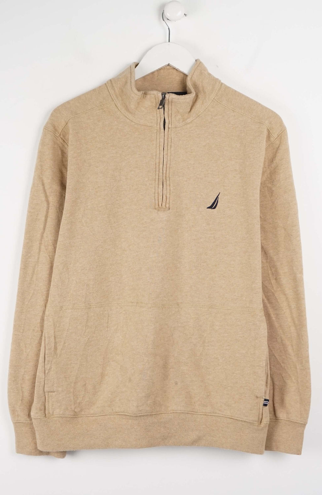 Beige pullover with a small logo on a white background