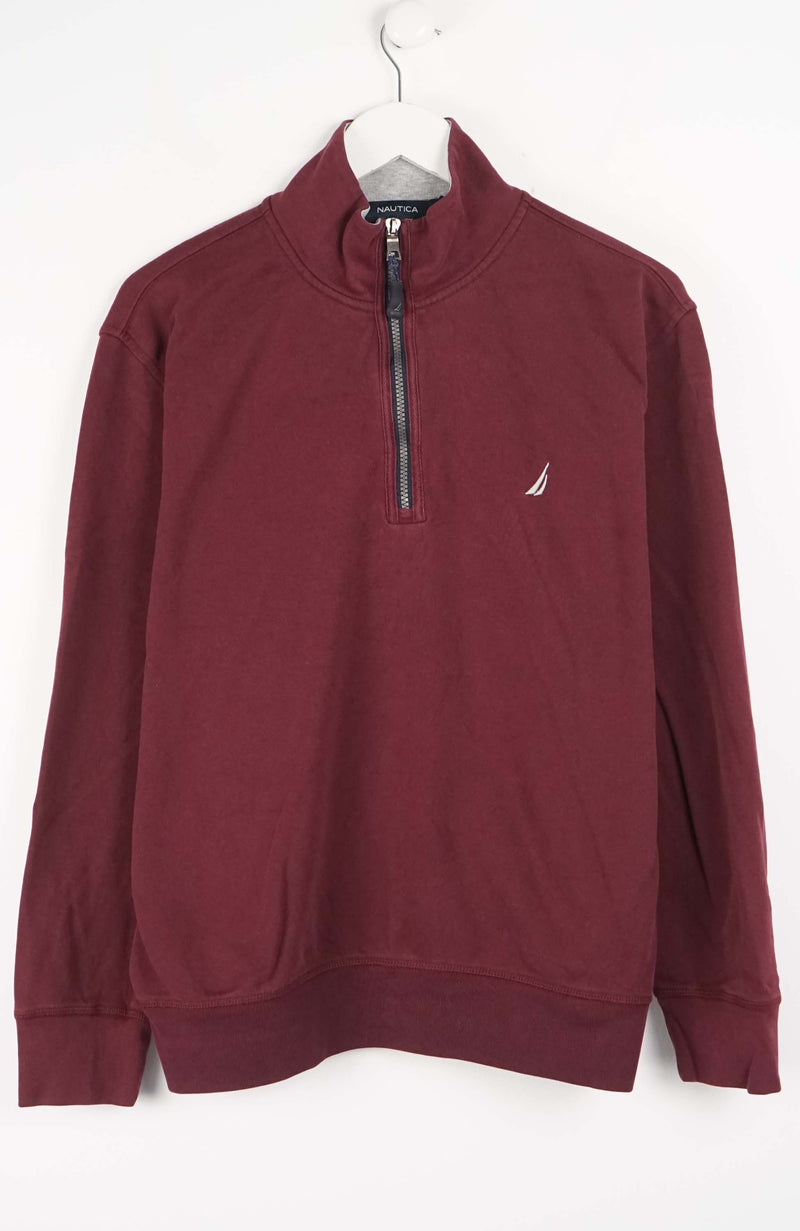 Maroon pullover with a small logo on a white background