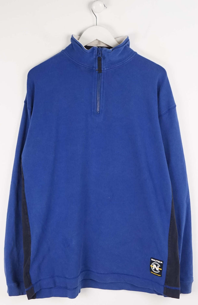 Blue pullover with a quarter zip on a white hanger