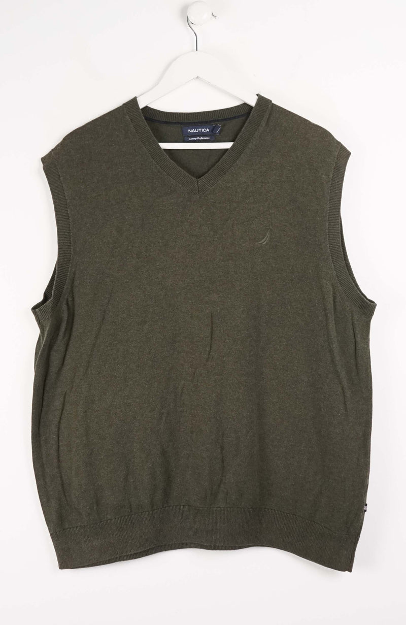 Green sweater vest on a white hanger with a white background