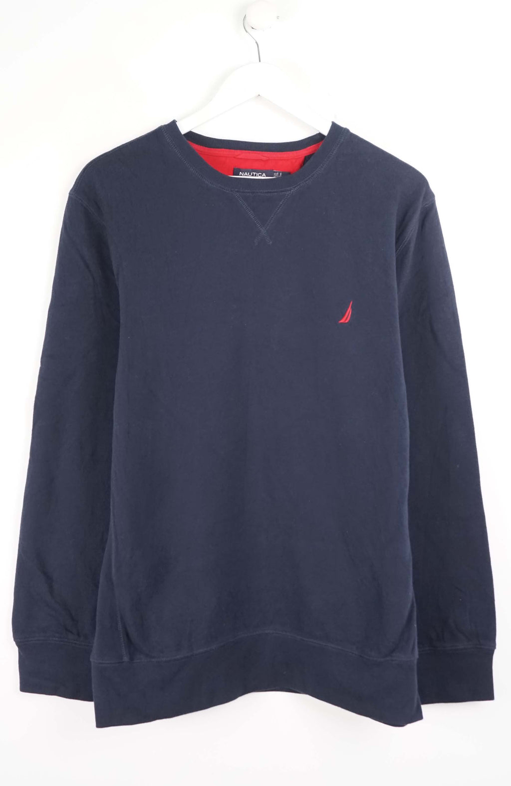 Navy blue sweatshirt with a small red logo on a white background