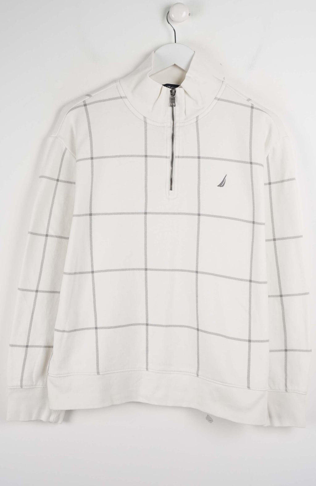 White checkered shirt with a small logo on a white background