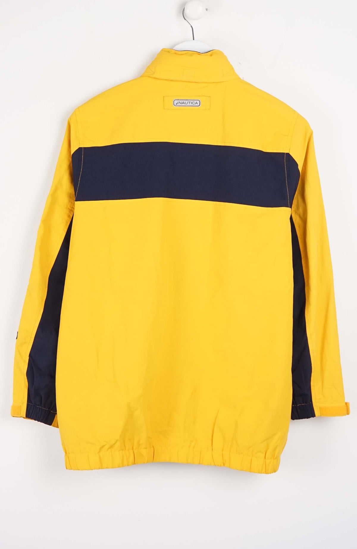 Yellow jacket with a navy stripe on a white background