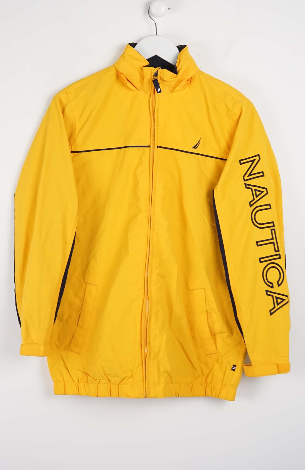 Yellow jacket with Nautica branding on a white background