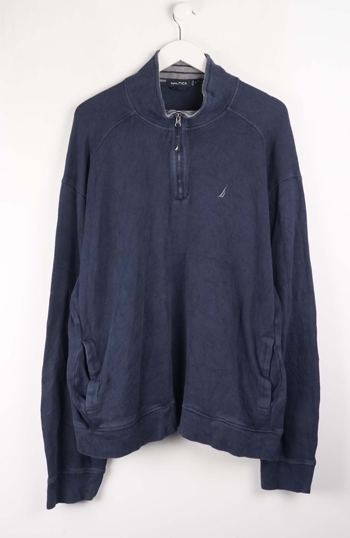 Blue sweater on a white background