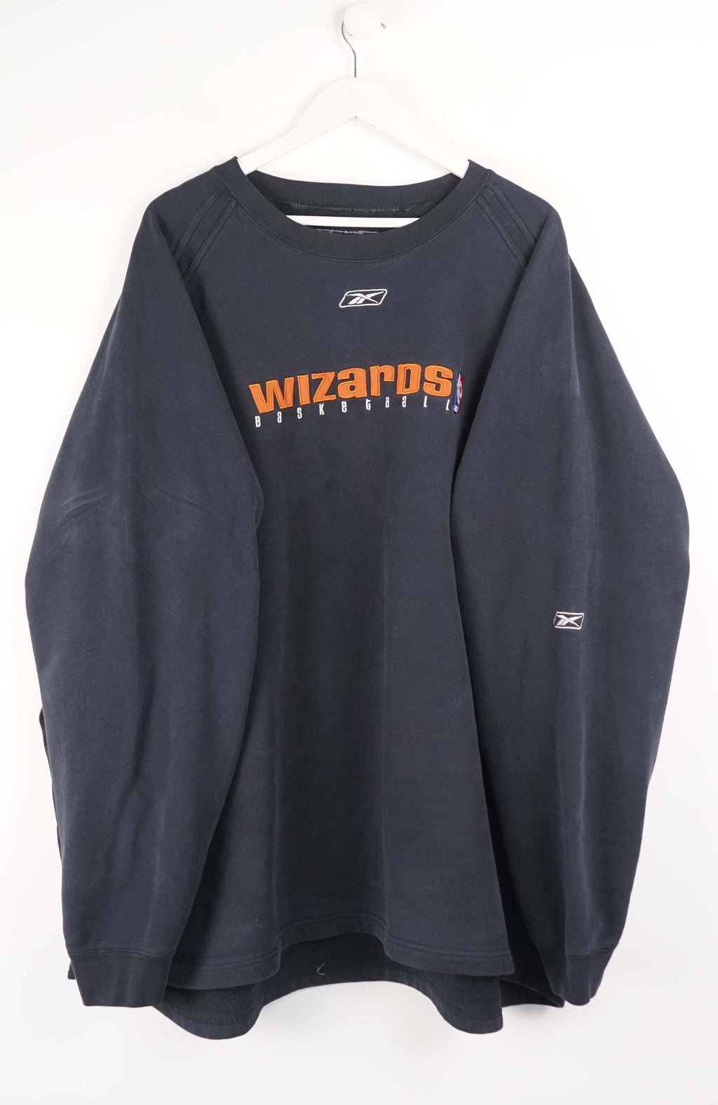 Navy blue sweatshirt with 'Wizards' text on a white background