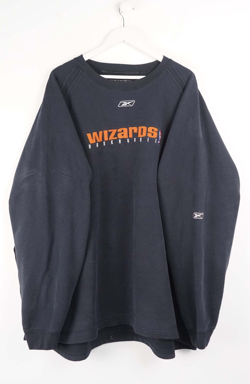 Navy blue sweatshirt with 'Wizards' text on a white background