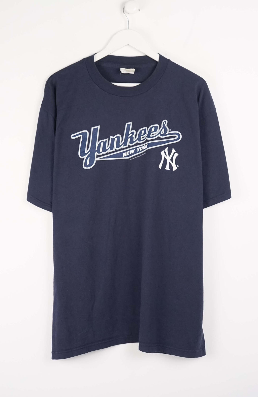 Navy blue t-shirt with 'Yankees' logo on a white background