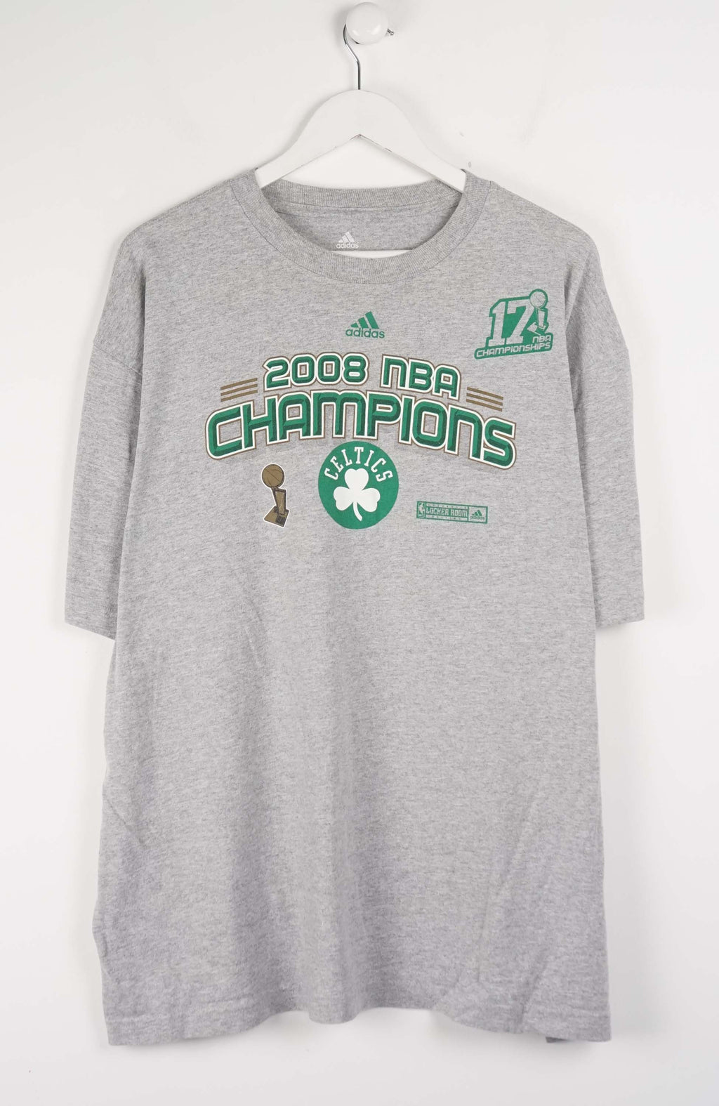 Gray t-shirt with NBA Champions text and graphics on a white background