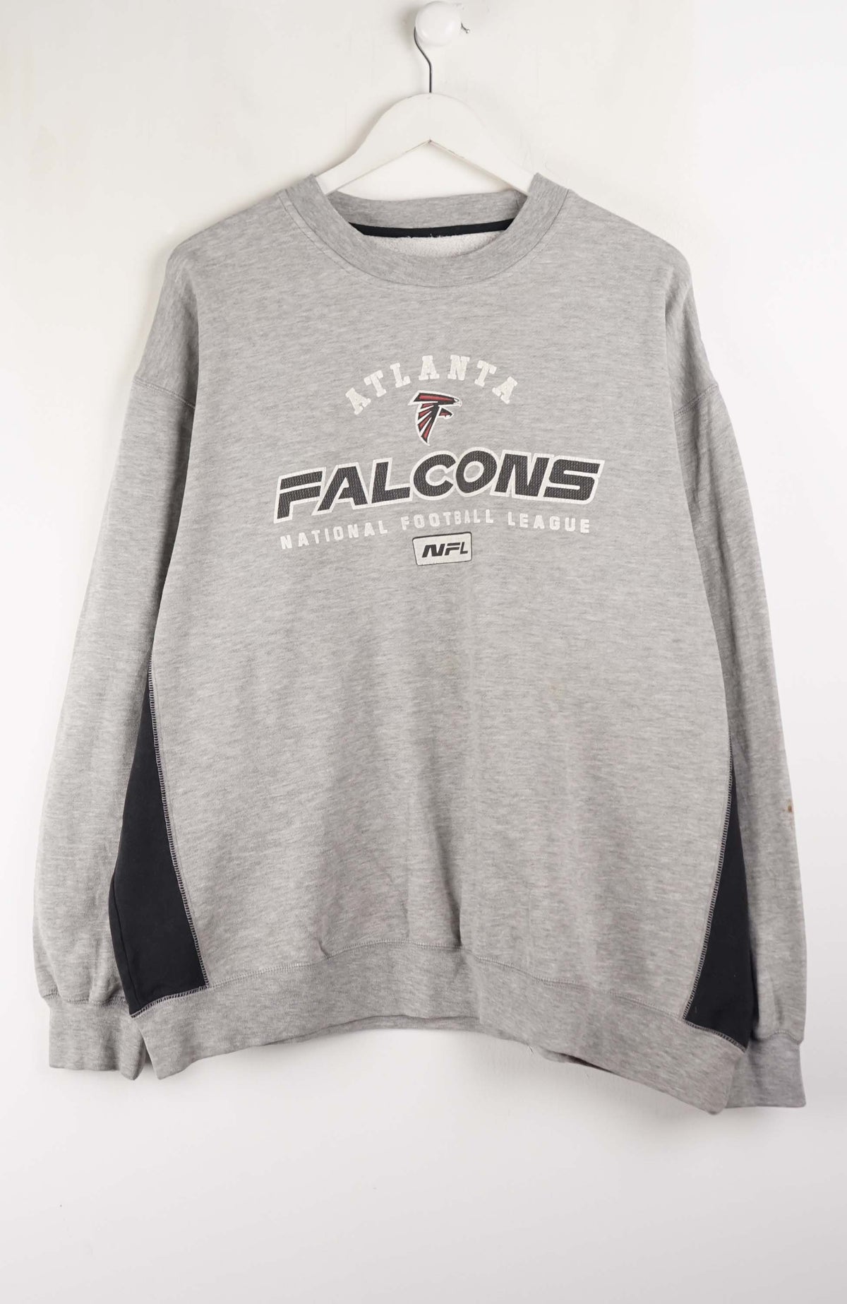 Gray sweatshirt with 'Atlanta Falcons' logo on a white background