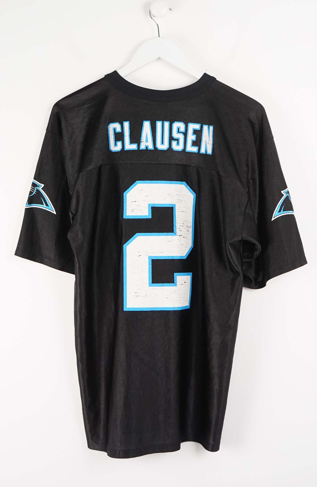 Black sports jersey with number 2 and team logos on a white background