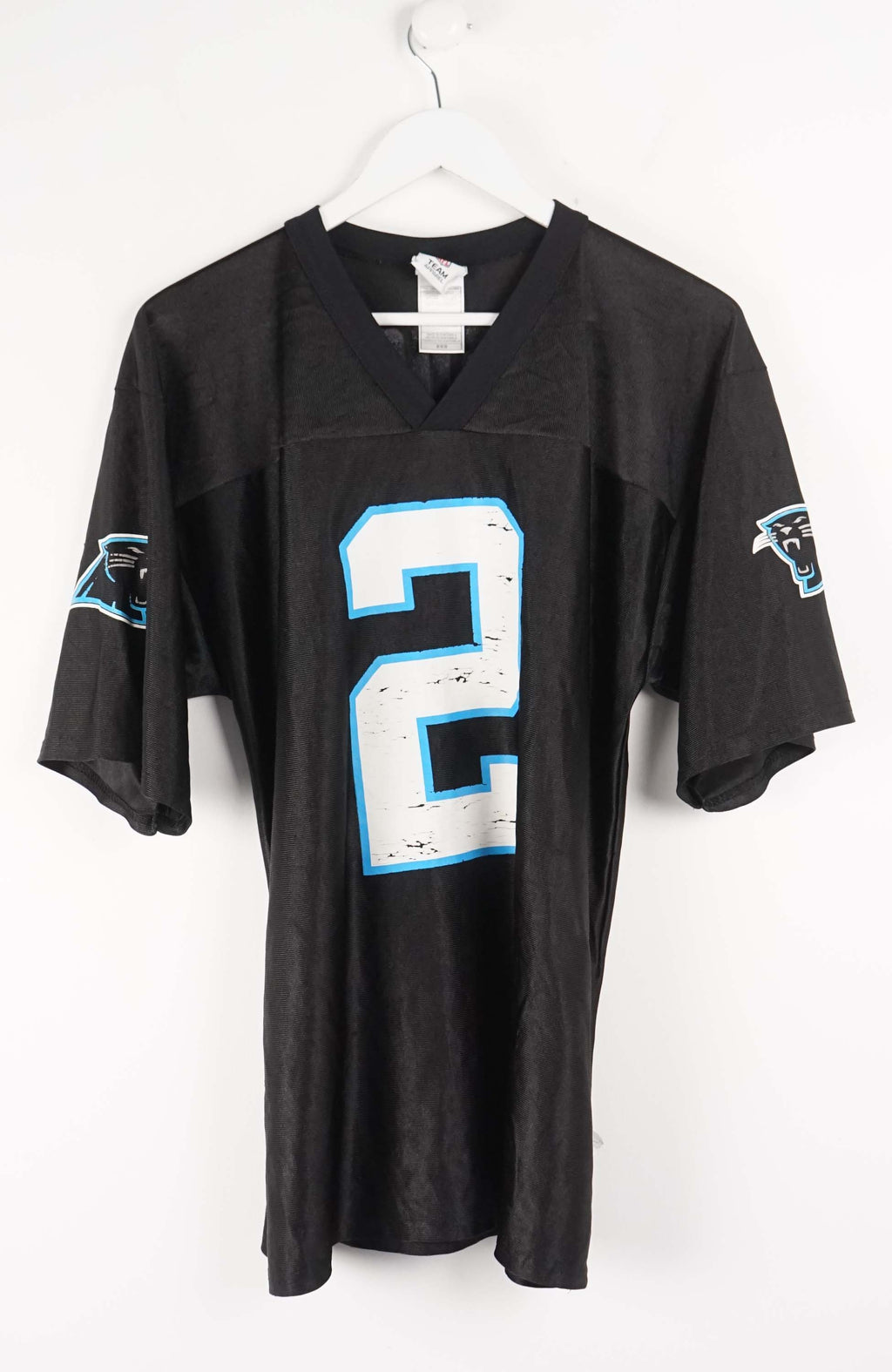 Black sports jersey with number 2 and team logos on a white background