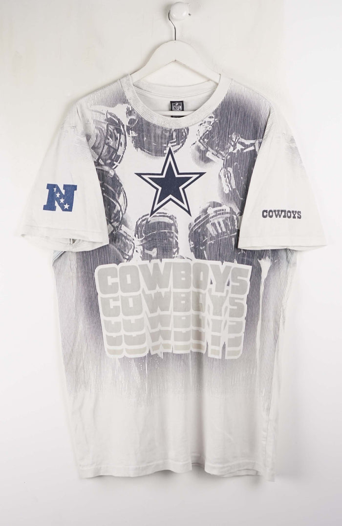 T-shirt with Dallas Cowboys logo and text on a white background