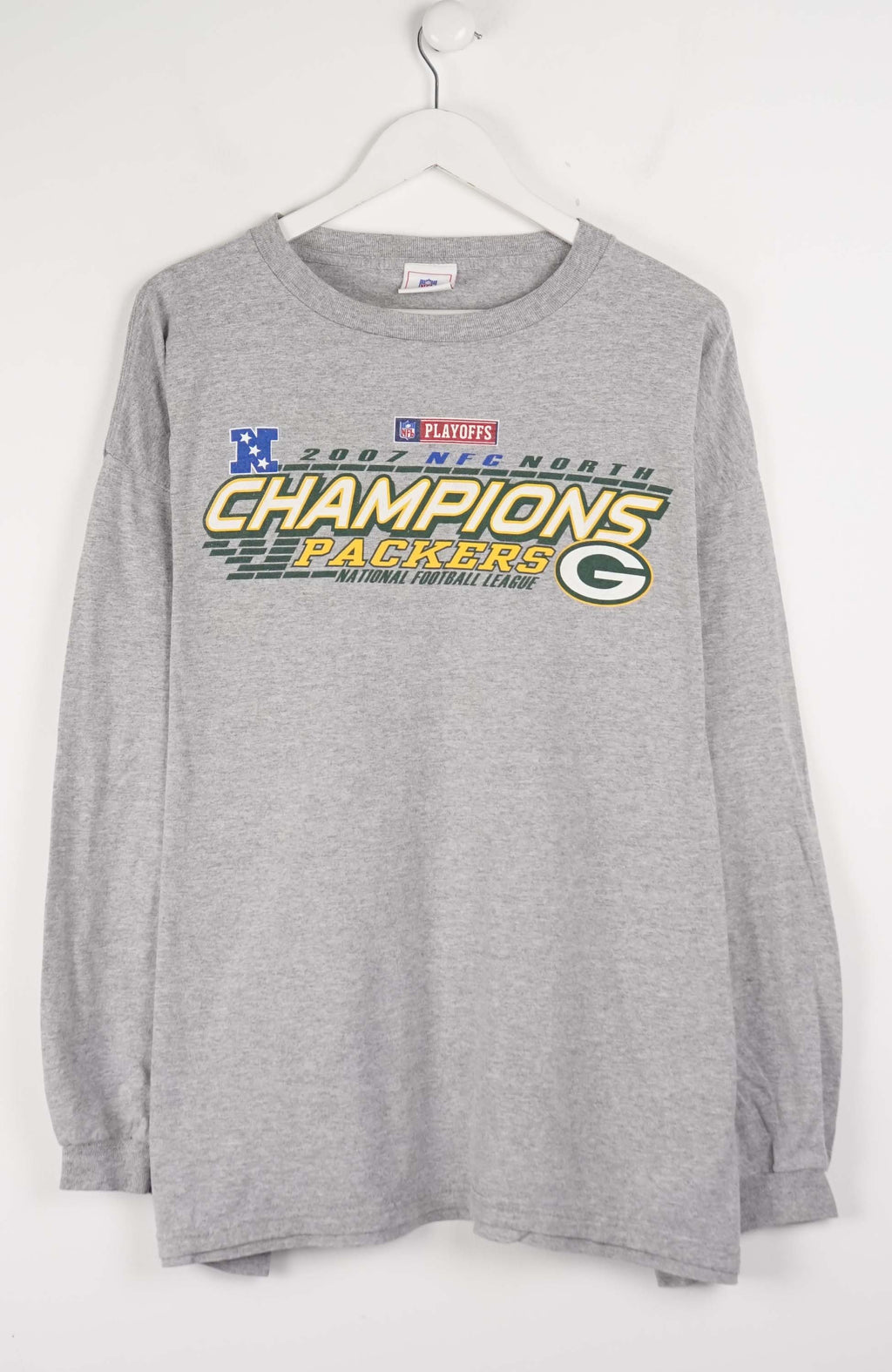 Gray long-sleeve shirt with sports team graphics on a white background