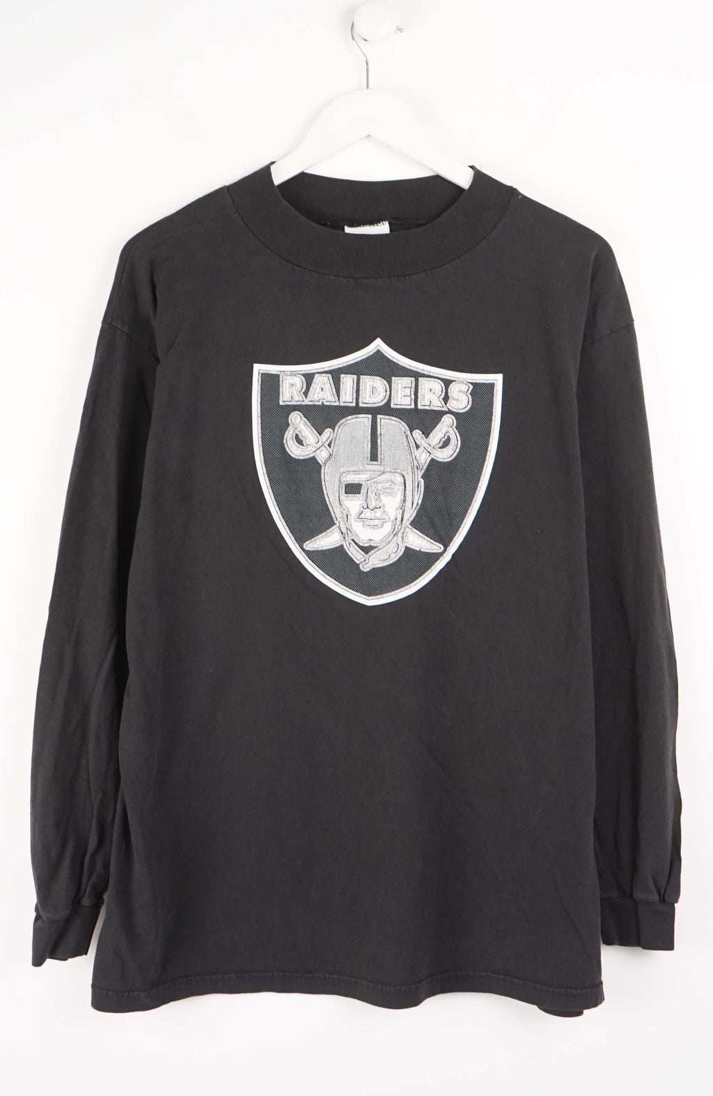 Black long-sleeve shirt with Raiders logo on a white background