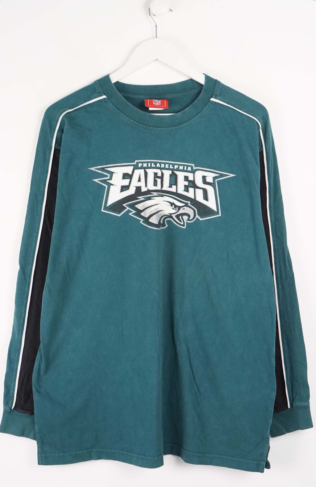 Green long-sleeve shirt with Philadelphia Eagles logo on a white background