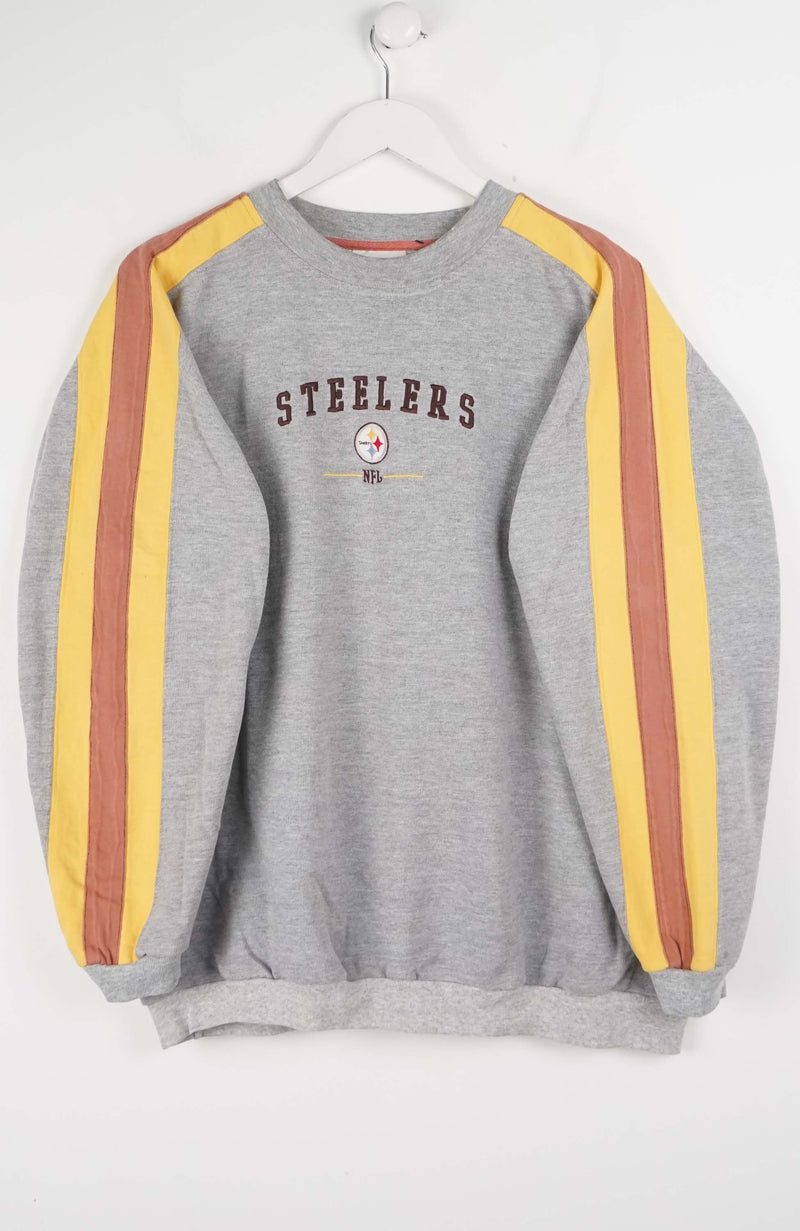 Gray sweatshirt with red and yellow stripes on sleeves, featuring 'Steelers' text and logo.
