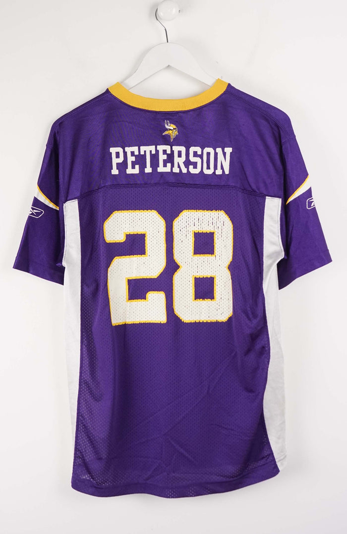 Purple sports jersey with number 28 and name 'Peterson' on a white background