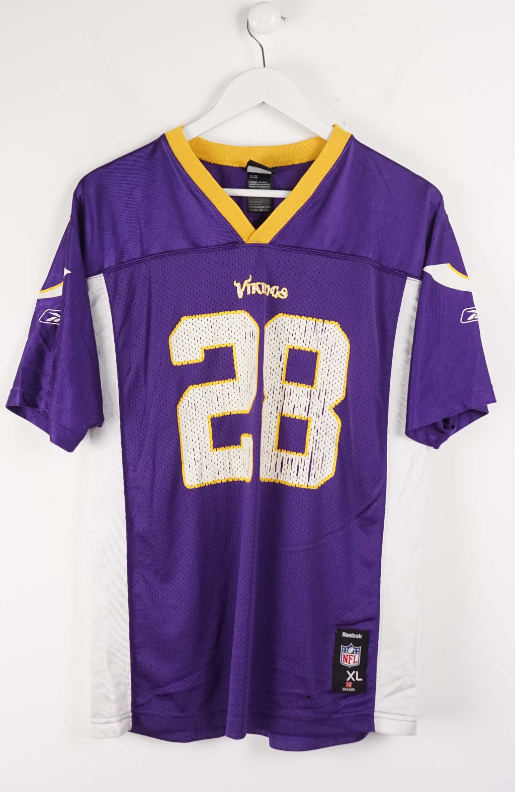 Purple football jersey with number 28 on a white background