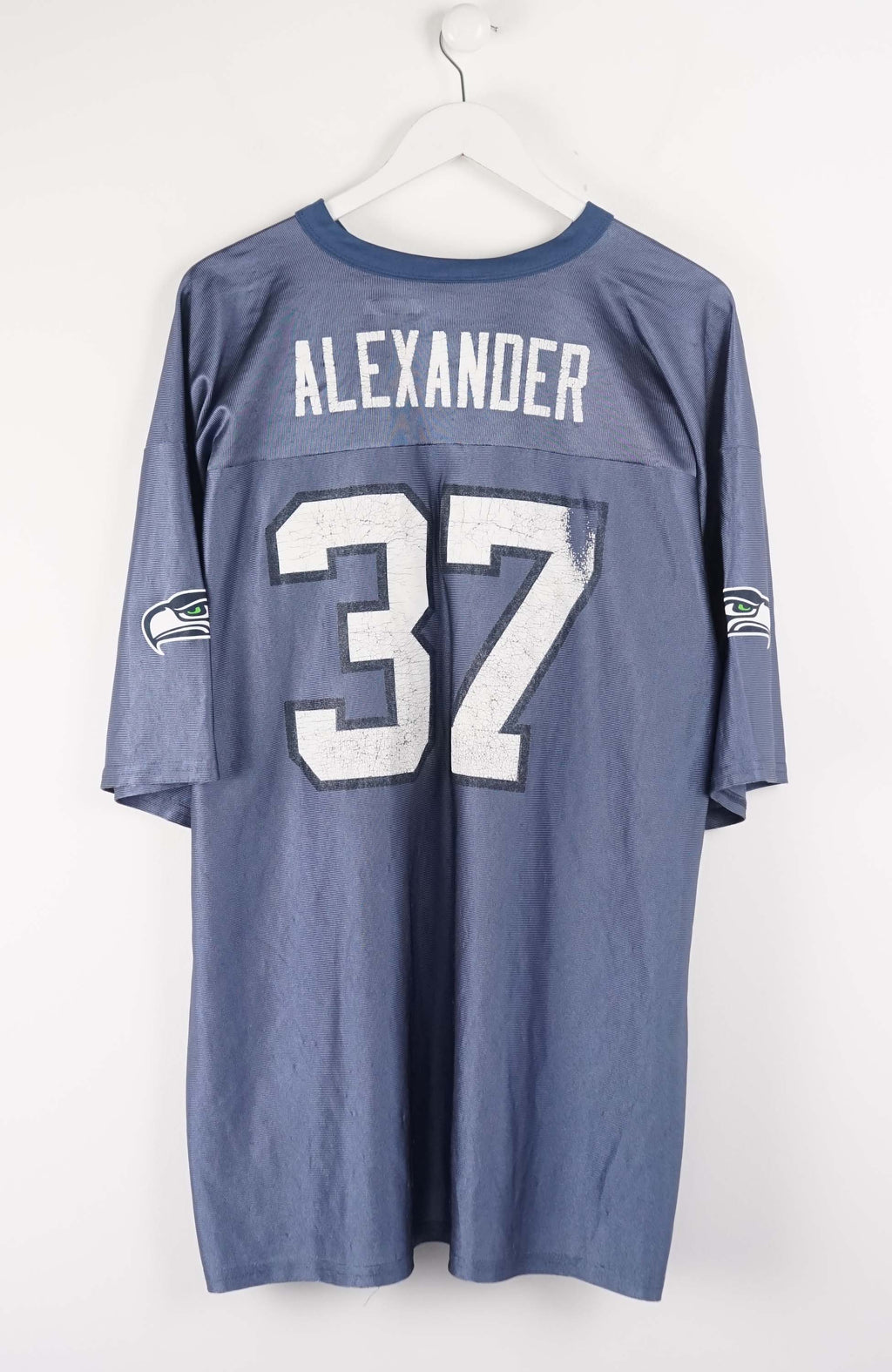 Blue sports jersey with number 37 on a white background