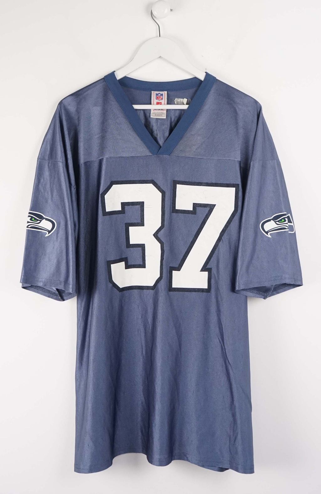 Blue sports jersey with number 37 on a white background