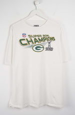 White t-shirt with Super Bowl Champions text and logo on a white background
