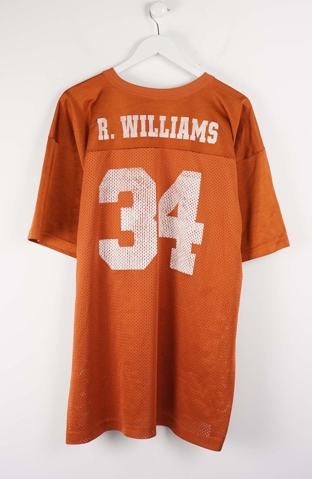 Orange sports jersey with number 34 on a white background