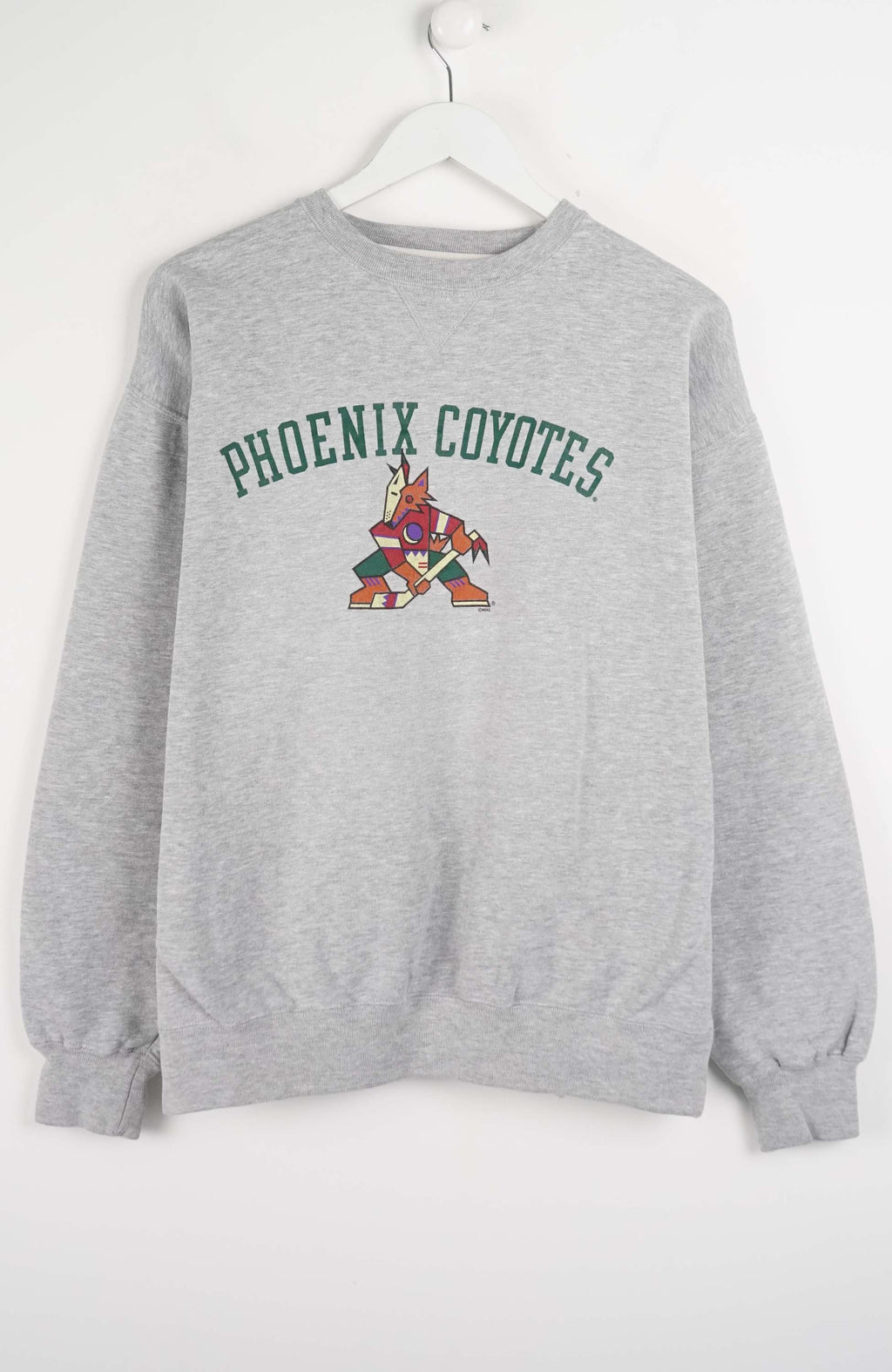 Gray sweatshirt with 'Phoenix Coyotes' text and logo on a white background