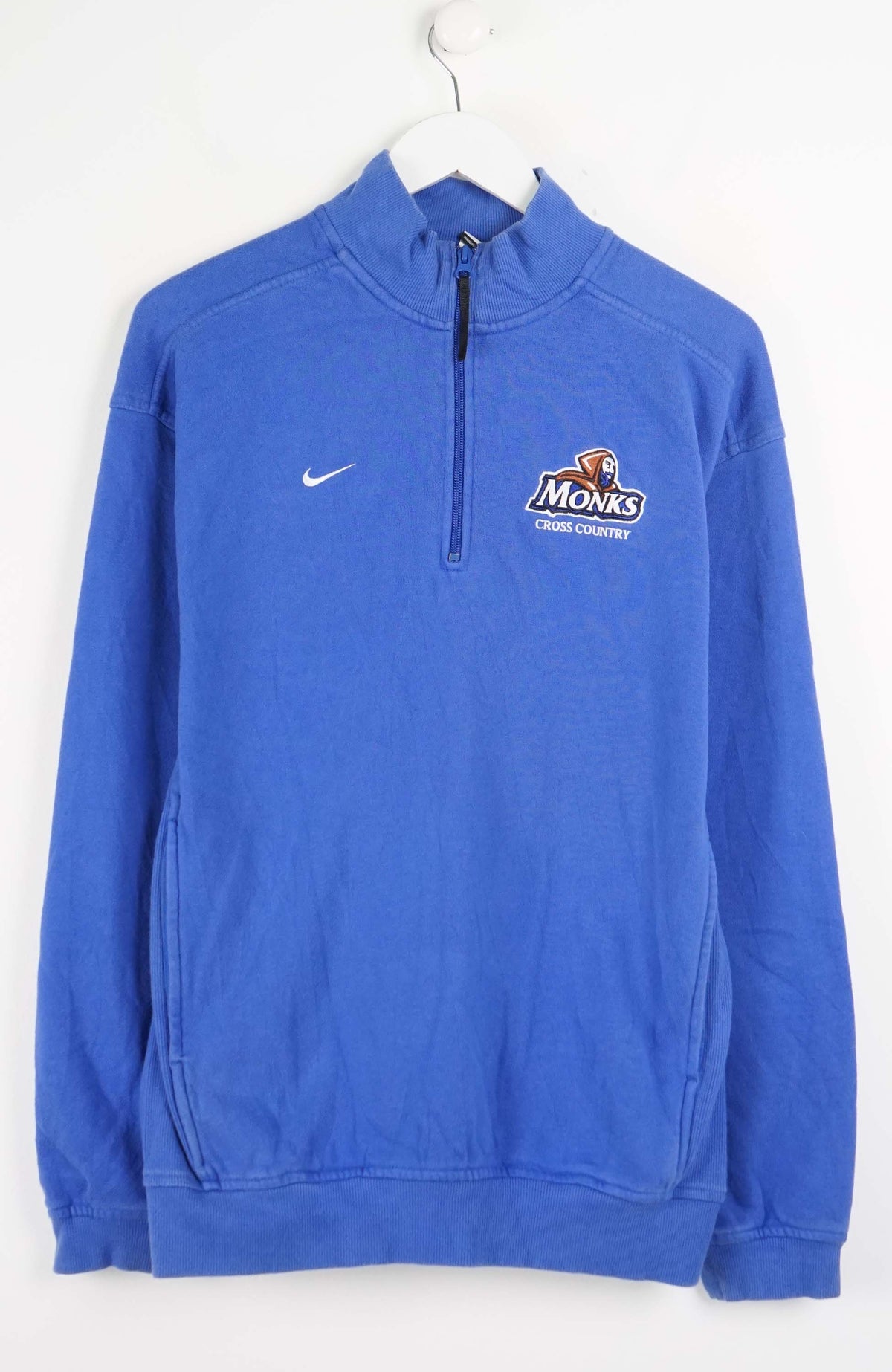 Blue sweatshirt with Nike logo on a white background
