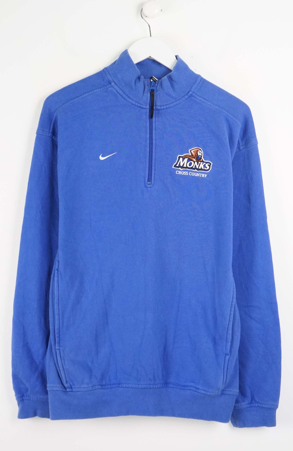 Blue sweatshirt with Nike logo on a white background