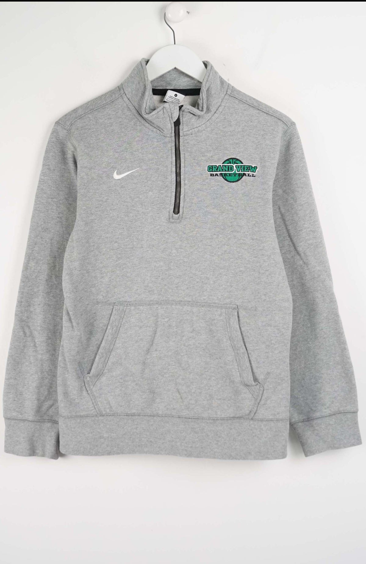 Gray Nike pullover with a logo on a white background